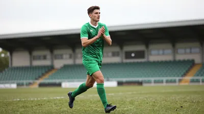 Yeovil Town have signed forward Owen Dean on a permanent deal until 2028, activating a release clause to bring the...